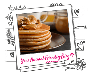 A delicious stack of pancakes with a peanut butter topping