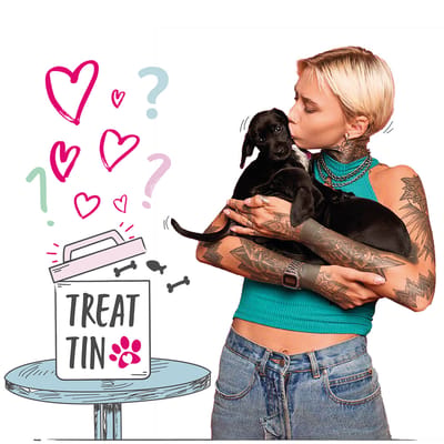 Photograph of a woman holding two puppies, standing beside an illustration of a treat tin