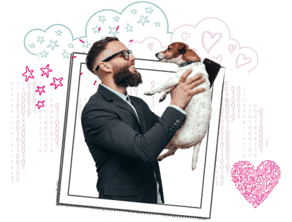 A bearded man with glasses holding a small dog